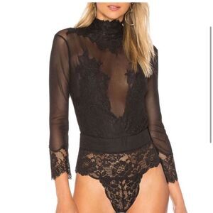 Free People x Take HAH
Bow Reversible Bodysuit in
Black size Large